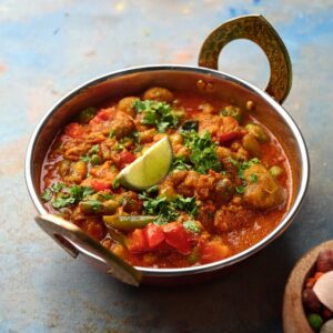 Combining the Vegetables and Spices for Pav Bhaji